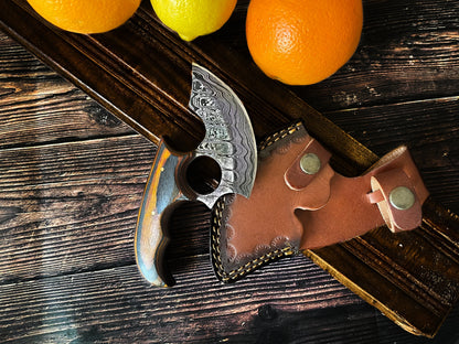 Titan Custom Alaskan Ulu style Damascus knife with patterned blade, wood handle, leather sheath on Tampa Home & Garden Store