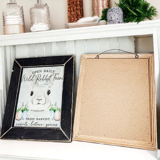 Two wooden signs Gia Roma Wild Rabbit Farms with frame and rabbit art on mantel on Tampa Home & Garden Store