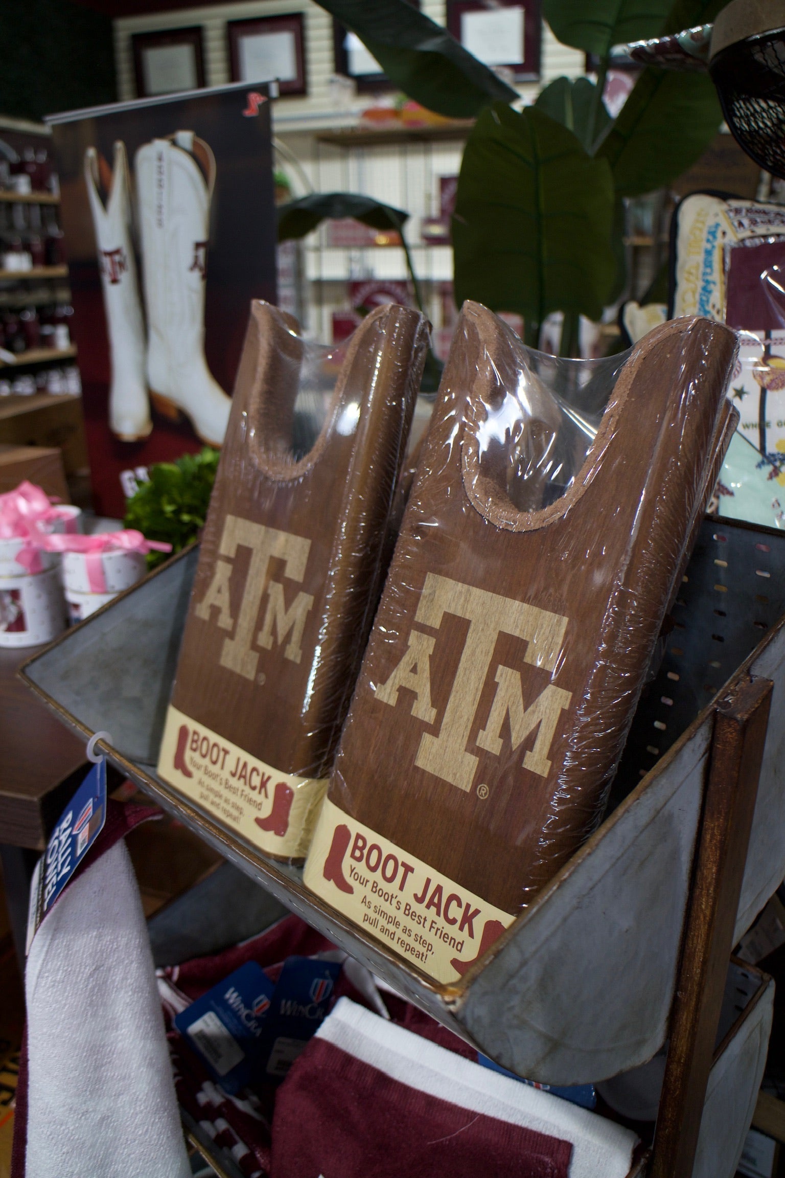Texas A&M boot jack set of 3 by Ryan's Woodworking, brown wooden boot pulls on display on Tampa Home & Garden Store