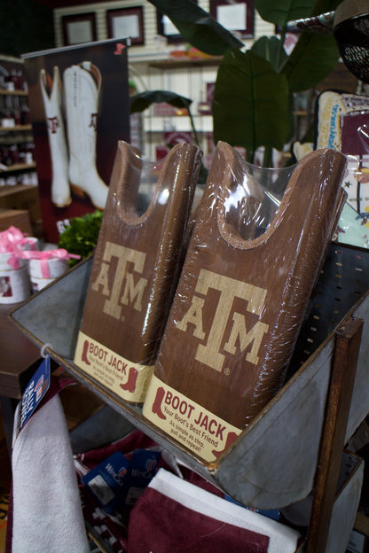 Texas A&M boot jack set of 3 by Ryan's Woodworking, brown wooden boot pulls on display on Tampa Home & Garden Store