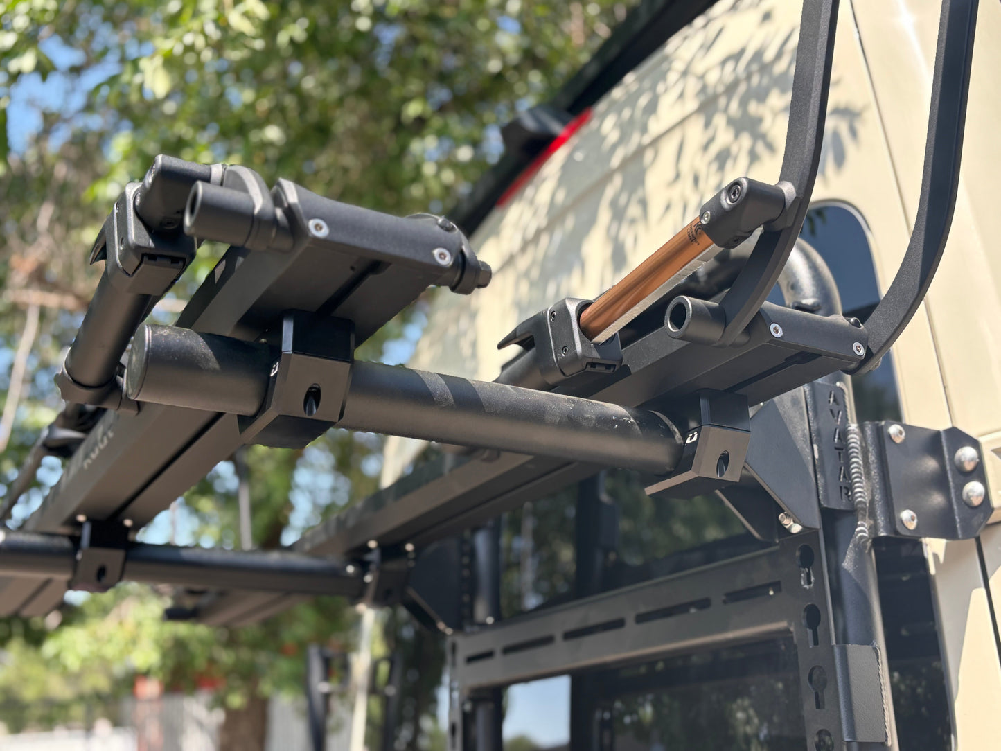 Bike Posts for Massif mount with copper-toned post and black clamp hardware on roof rack on Tampa Home & Garden Store
