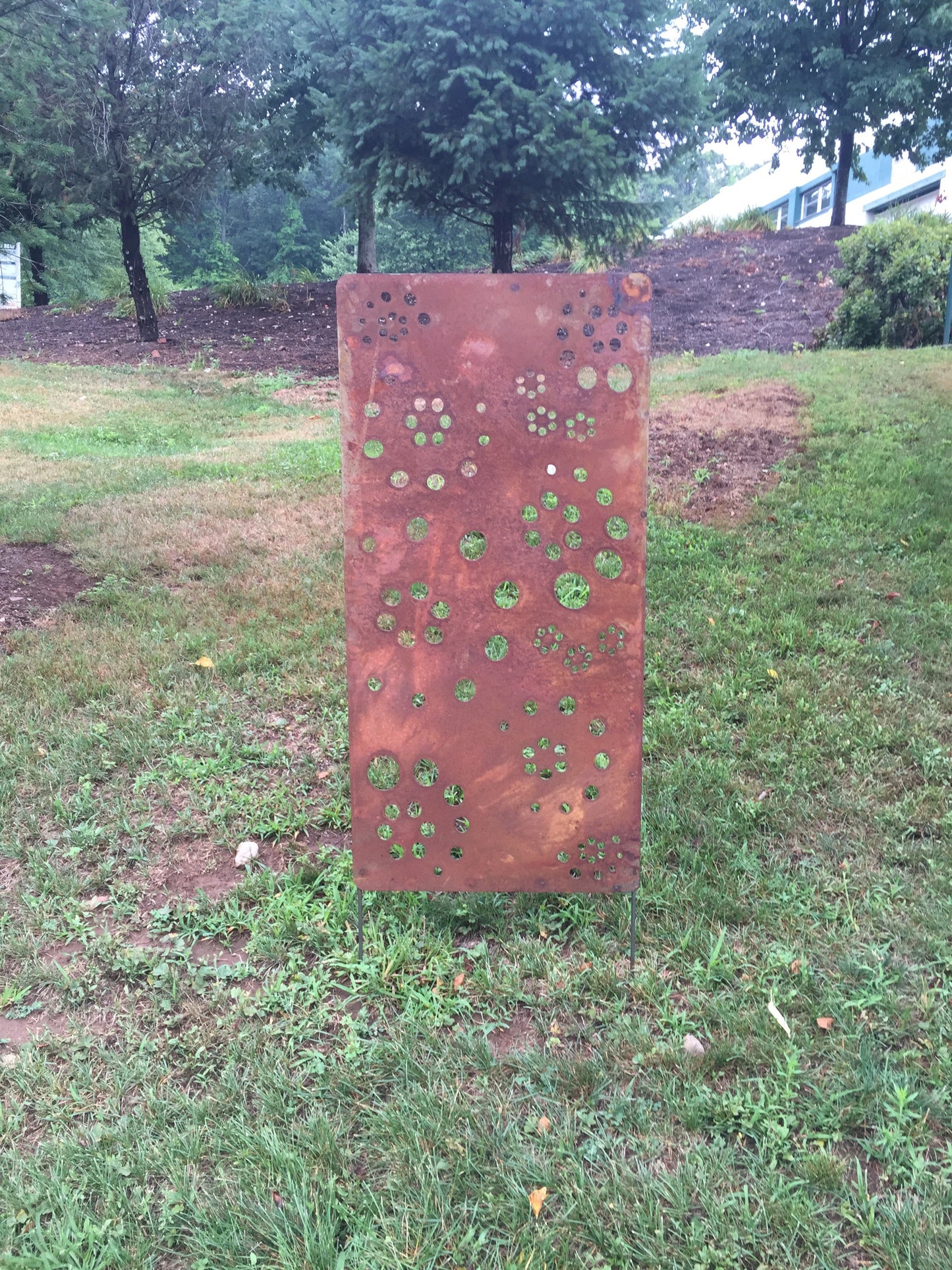 Outdoor metal privacy wall panel rust with circular cutouts heavy-duty steel Rustica Ornamentals on Tampa Home & Garden Store