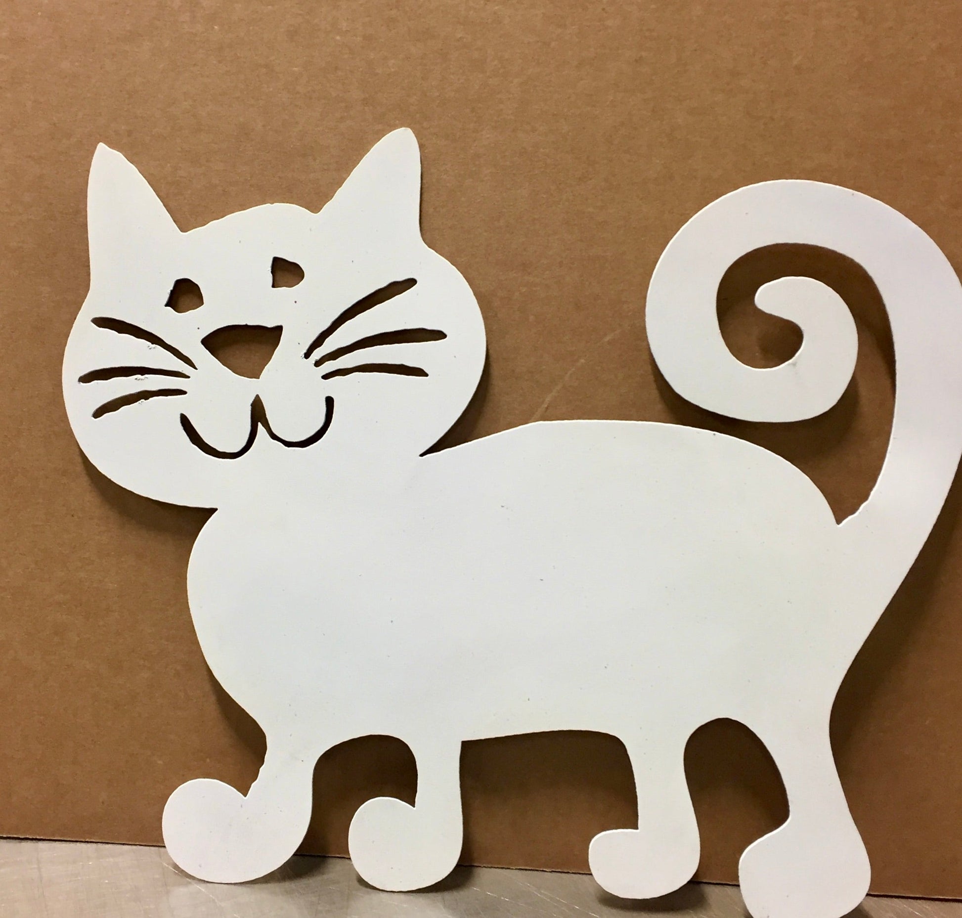 Cat Garden Stake white metal silhouette with cutout eyes and whiskers, lawn ornament on Tampa Home & Garden Store