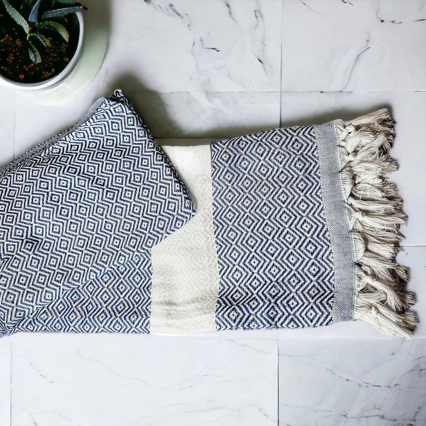 Haley Diamond Towel Gia Roma: blue diamond pattern beach towels with fringe on marble floor on Tampa Home & Garden Store
