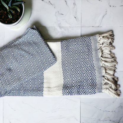 Haley Diamond Towel Gia Roma: blue diamond pattern beach towels with fringe on marble floor on Tampa Home & Garden Store