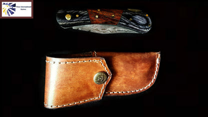 TF-009 folding knife with dark wood handle and brass pins by Titan, brown leather sheath on Tampa Home & Garden Store