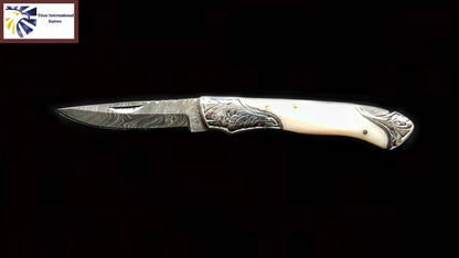 TF-005 knife by Titan International Knives Damascus blade ivory handle and engraved bolsters on Tampa Home & Garden Store