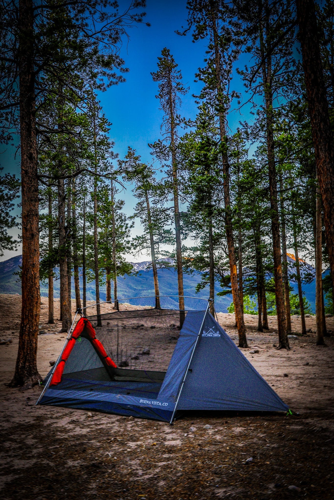 Sky View Duo Tent blue camping tent with a second nearby tent among pine trees on Tampa Home & Garden Store