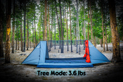 Sky View Duo Tent blue camping tent with mesh front walls set in a pine forest on Tampa Home & Garden Store