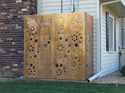 Two-panel rusted metal privacy screen with circular cutouts, Rustica Ornamentals outdoor decor on Tampa Home & Garden Store