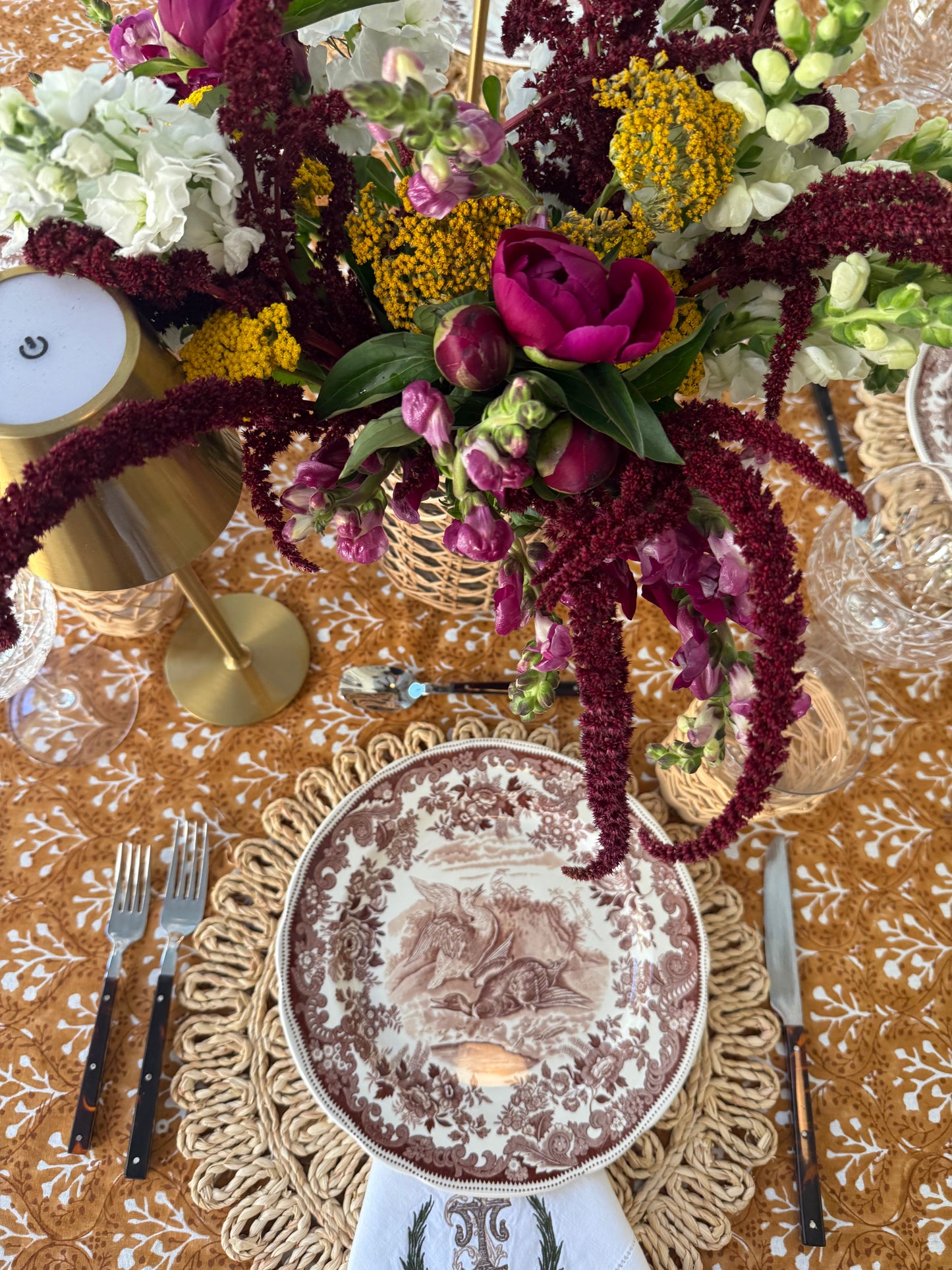 Laurel Tablecloth in Goldenrod by Erin Donahue Tice, with burgundy amaranthus on Tampa Home & Garden Store