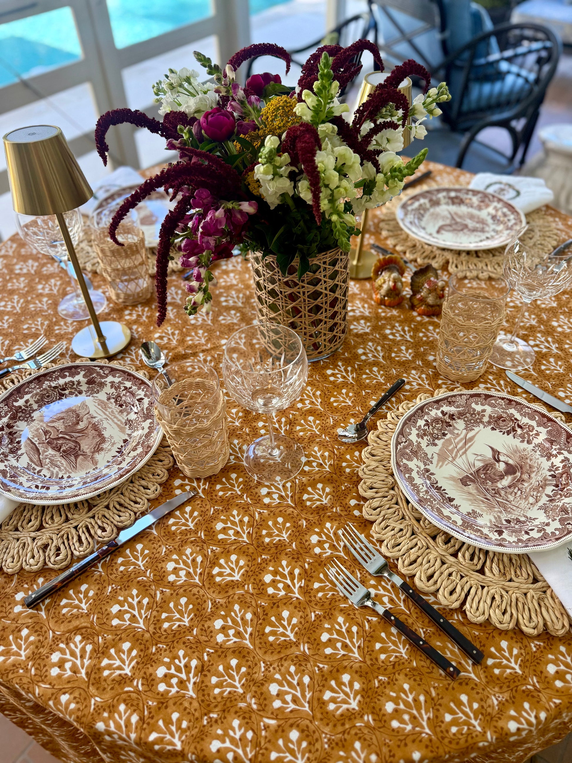 Laurel Tablecloth in Goldenrod by Erin Donahue Tice with white botanical pattern on Tampa Home & Garden Store
