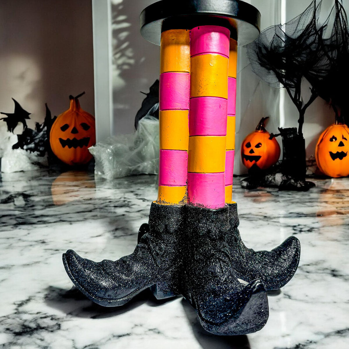 Wicked Witch Candle Holder by Gia Roma with pink/orange tower atop glittery black base on Tampa Home & Garden Store