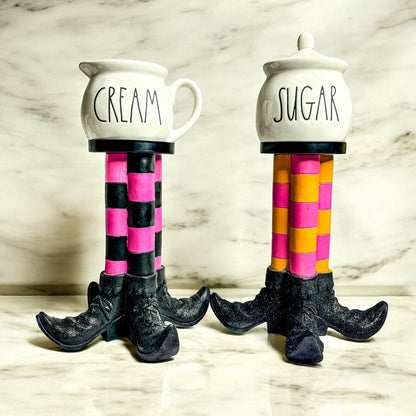 Wicked Witch Candle Holder pair with striped legs and cream and sugar jars on Tampa Home & Garden Store