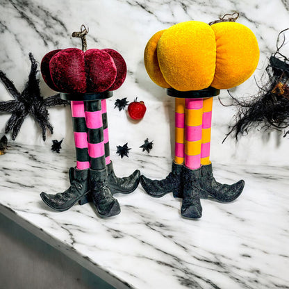 Wicked Witch Candle Holder duo with pink/black striped legs and glitter boots pumpkins on Tampa Home & Garden Store