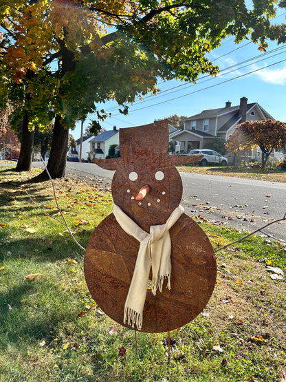 Large rusted metal snowman sculpture with beige scarf, Christmas decor by Rustica Ornamentals on Tampa Home & Garden Store