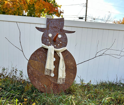 Large outdoor snowman sculpture rusted metal with cream scarf by Rustica Ornamentals on Tampa Home & Garden Store