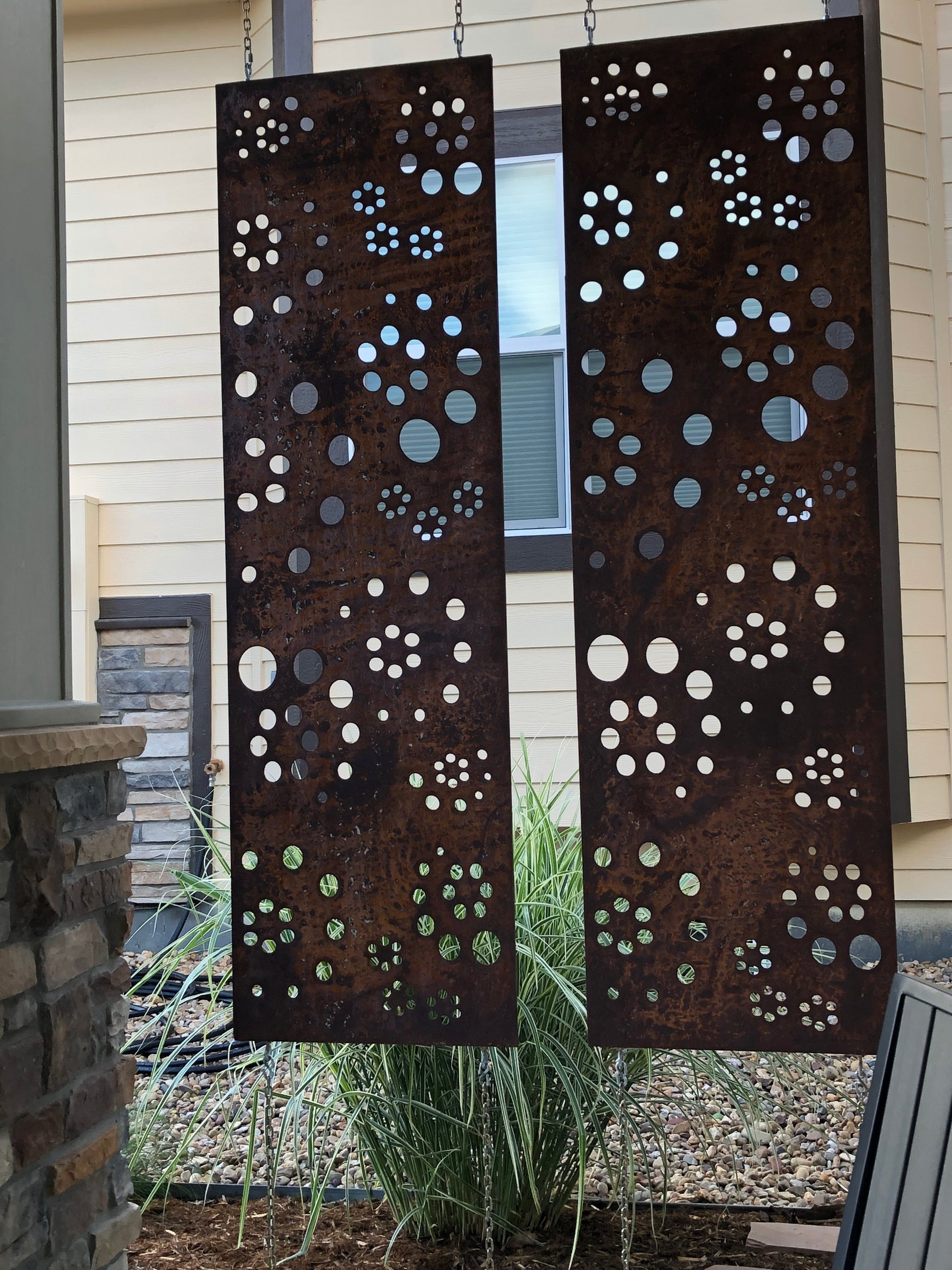 Metal privacy screen panels in rust finish with circular cutouts, 2-panel Rustica on Tampa Home & Garden Store
