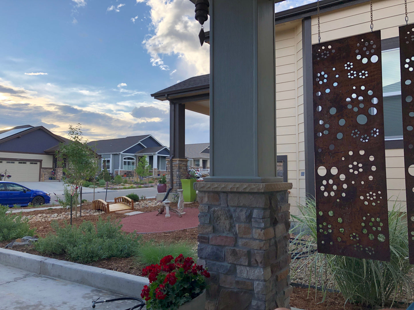 Two-panel metal privacy screen with rusted circular perforations, 46-inch panels by Rustica Ornamentals on Tampa Home & Garden Store