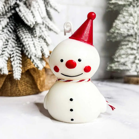 Snowman Shaped Mini Candle by Gia Roma, white two-tier figure with red hat and rosy cheeks on Tampa Home & Garden Store