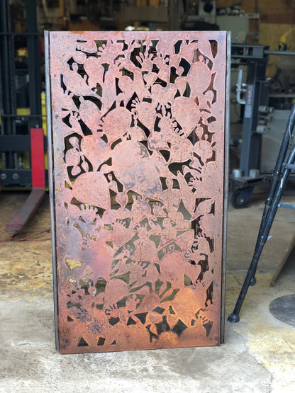 Outdoor privacy panel by Rustica Ornamentals in rusted steel with intricate floral cutouts on Tampa Home & Garden Store