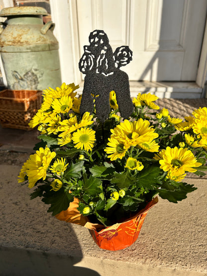 Poodle ornament plant stake in black metal by Rustica Ornamentals among yellow mums on Tampa Home & Garden Store