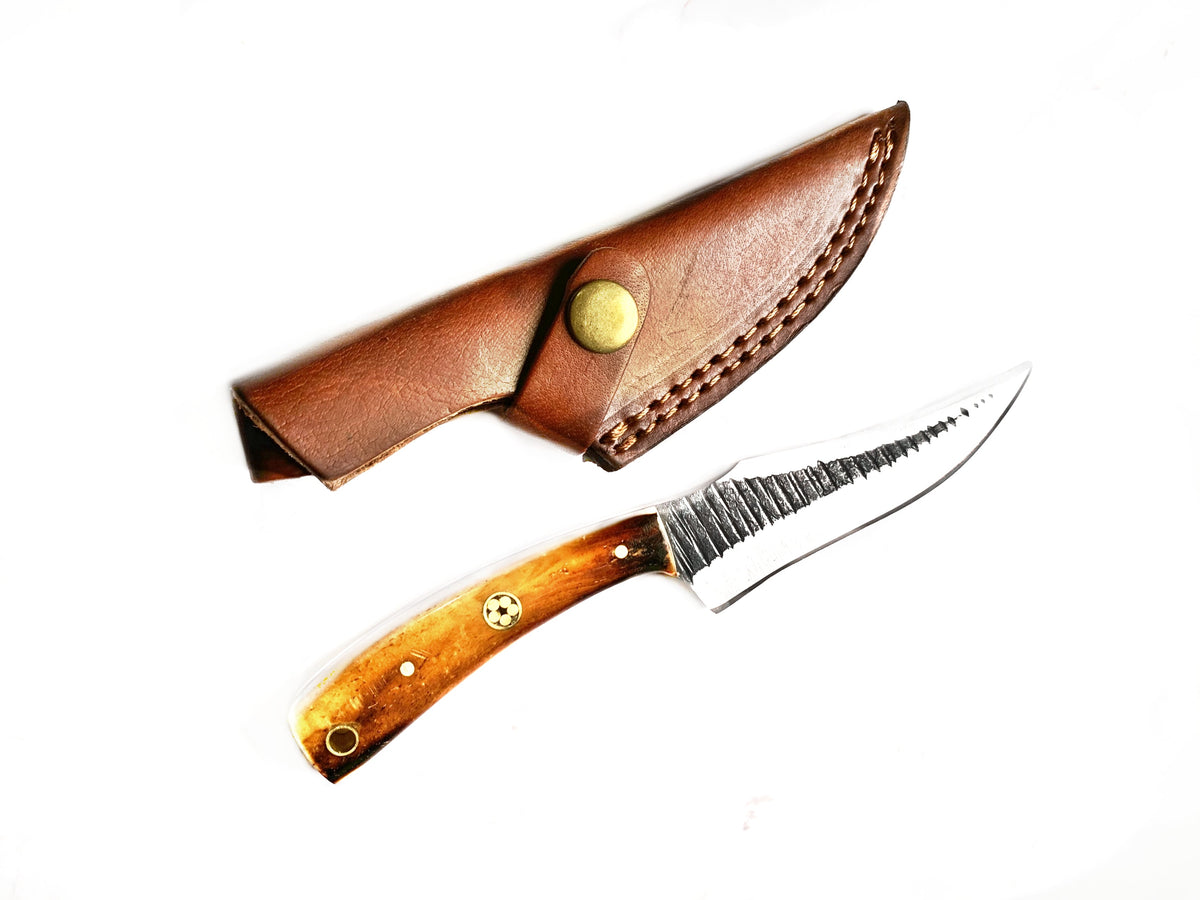 Carbon Skinning Knife TC-60 by Titan International K with brown leather sheath and brass rivets on Tampa Home & Garden Store