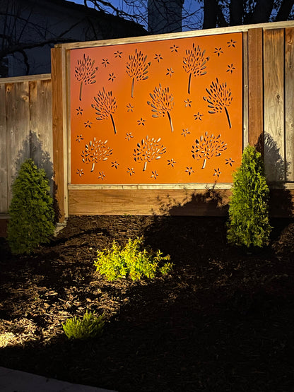 Outdoor metal privacy screen panel by Rustica Ornamentals, orange steel with tree silhouettes on Tampa Home & Garden Store