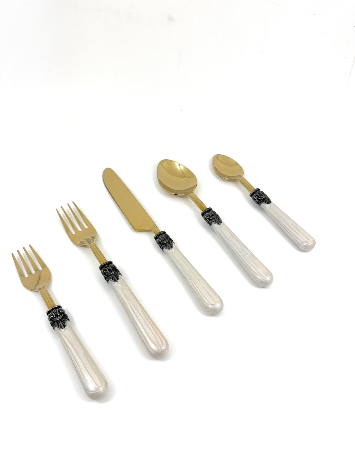 Vibhsa 20-piece flatware set with white resin handles and gold-tone antique design on Tampa Home & Garden Store