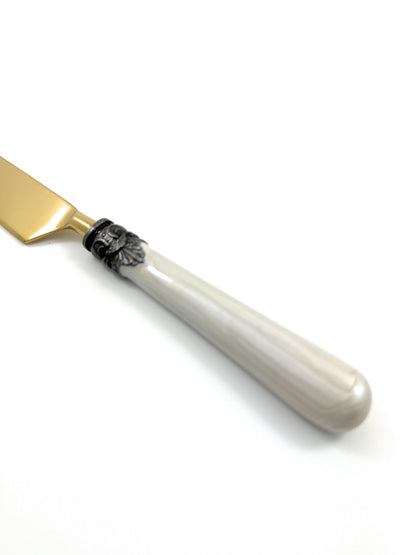 Vibhsa white resin-handle flatware knife with antique black collar and gold blade on Tampa Home & Garden Store