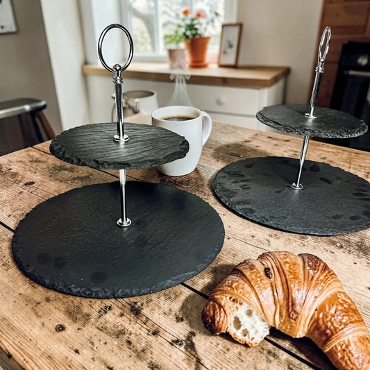 Tiered slate stand set of 2 with black slate rounds and chrome posts Gia Roma on rustic wood table on Tampa Home & Garden Store