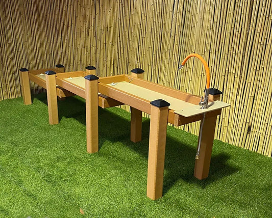 Kids' Station outdoor water table with triple troughs and orange flexible faucet on wooden frame on Tampa Home & Garden Store