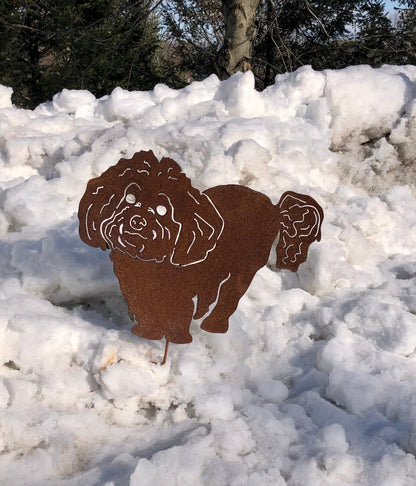 Two rust-colored metal Bichon Frise garden stake silhouettes for outdoor wall hanging on Tampa Home & Garden Store