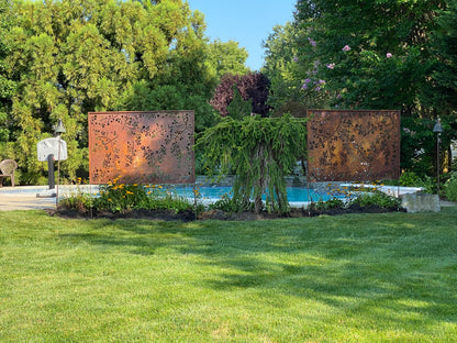 Outdoor metal privacy screen panels by Rustica Ornamentals, rusted steel wattle twig design on Tampa Home & Garden Store