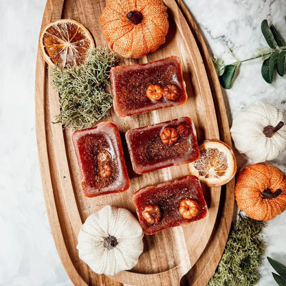 Pumpkin Buttercream Wax Melts Cinnamon Pie orange tarts with pumpkins on top on a wooden board on Tampa Home & Garden Store