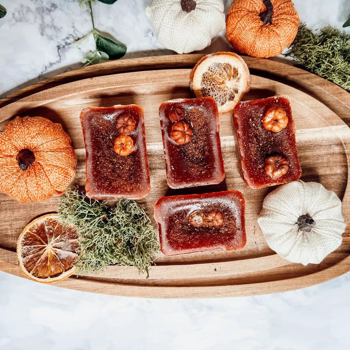 Gia Roma Pumpkin Buttercream Wax Melts Cinnamon Pie four fall wax tarts on wood board on Tampa Home & Garden Store