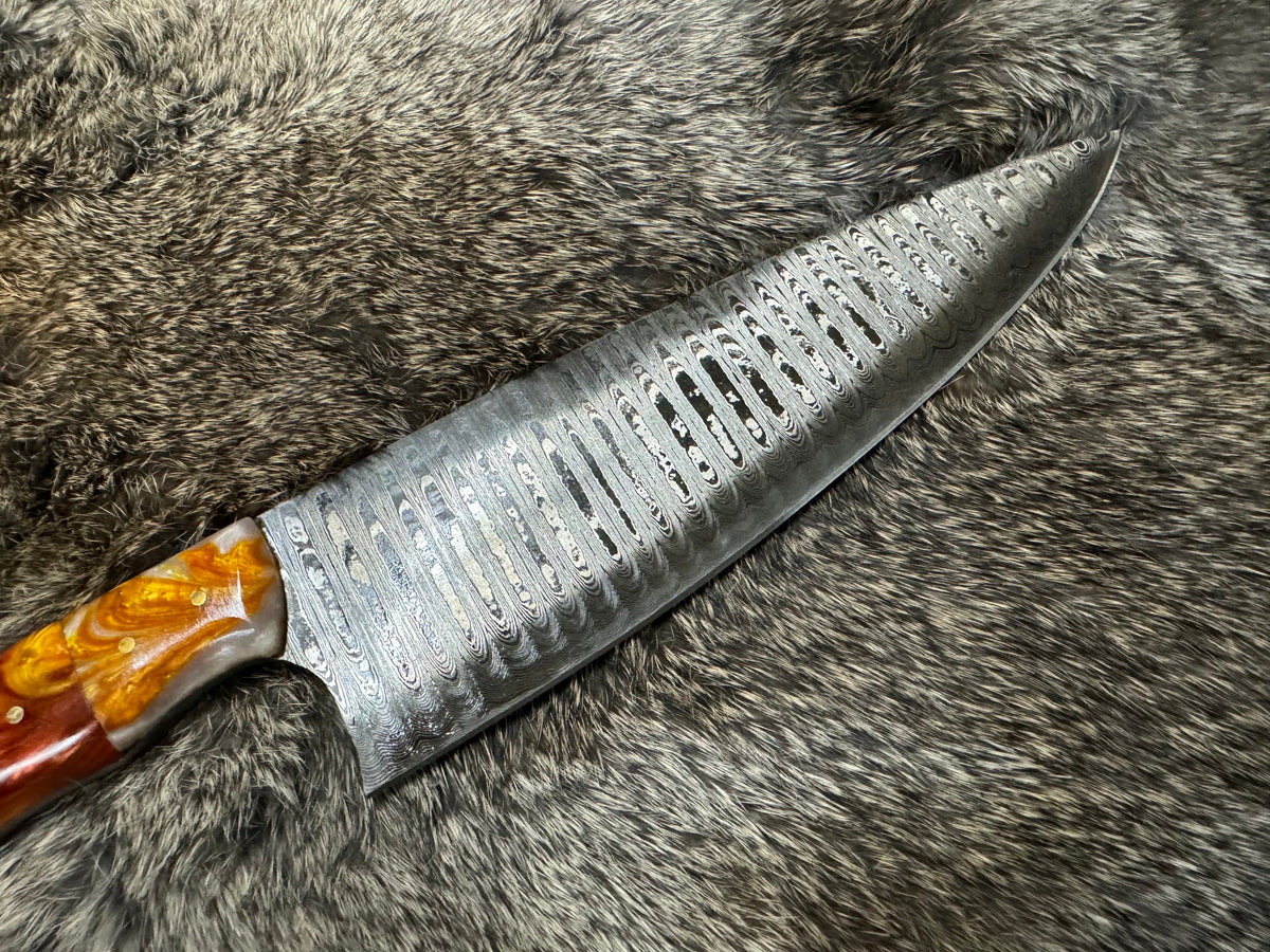 Damascus steel chef knife TK-104 by Titan Int'l K, patterned blade and amber handle on Tampa Home & Garden Store