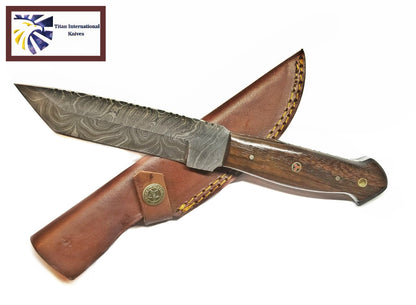 TD-049 Titan Damascus knife with wooden handle and yellow-stitched leather sheath on Tampa Home & Garden Store