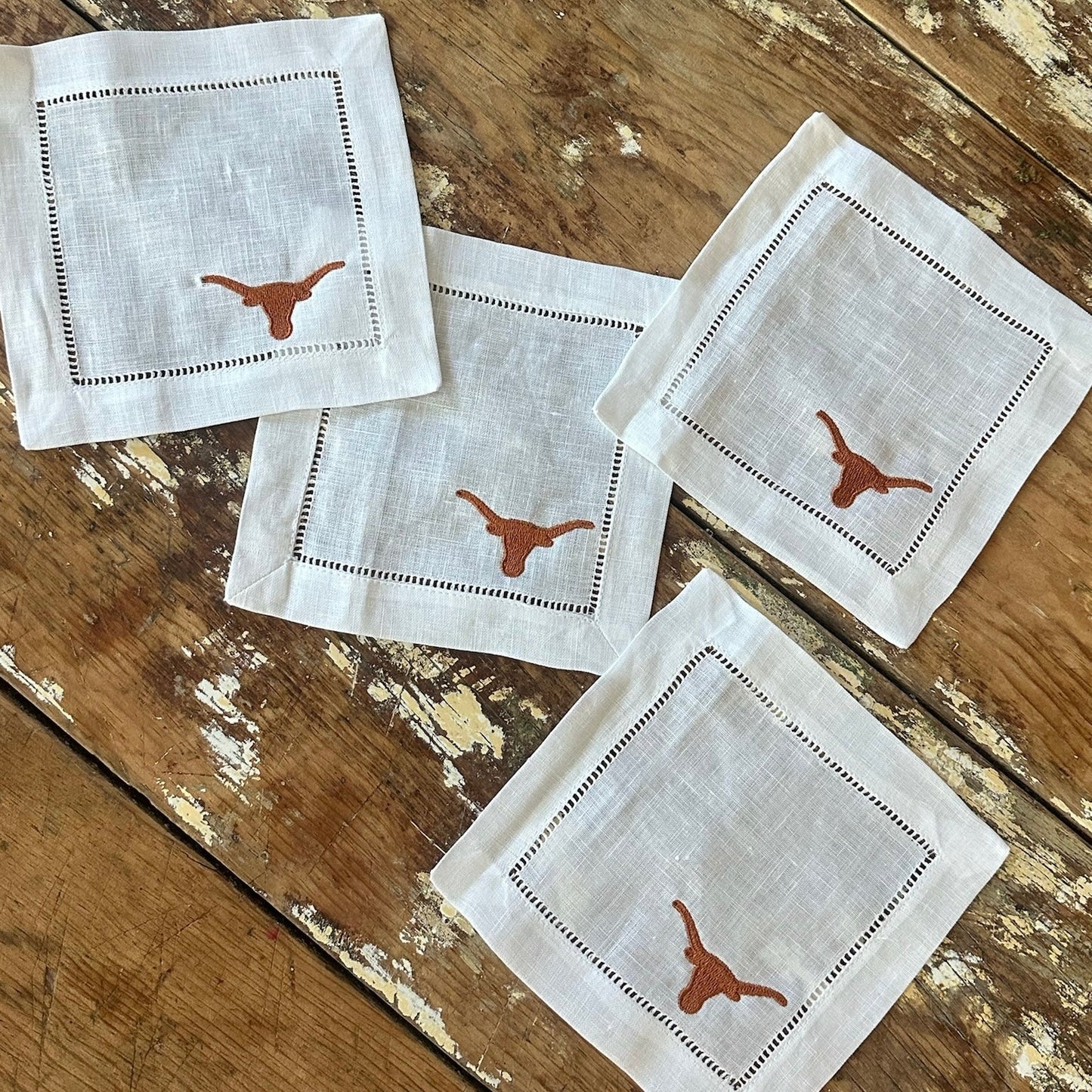 Texas Longhorns cocktail napkins, Ryan's Woodworking, white linen with orange longhorn motif on Tampa Home & Garden Store