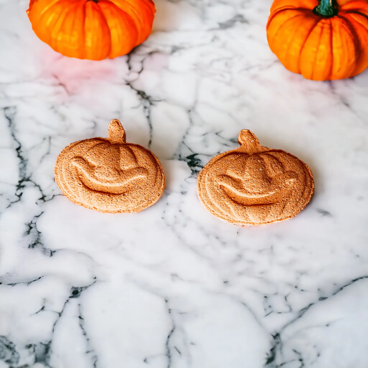 Pumpkin Spice Bath Bombs, orange-brown swirl discs, 3 pcs on marble surface on Tampa Home & Garden Store