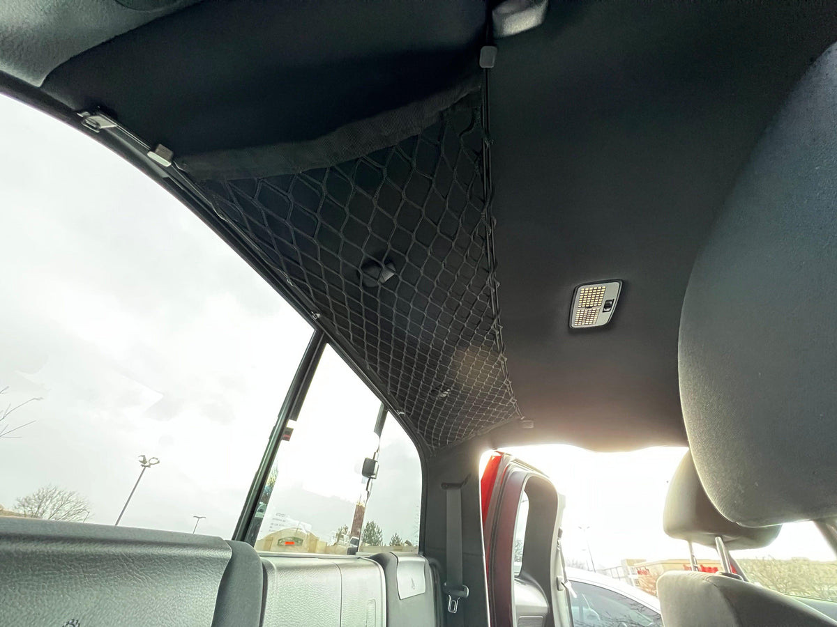 Toyota Tacoma Attic Storage Net by Flatirons Overland, black nylon cargo net in cab on Tampa Home & Garden Store
