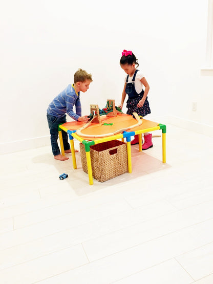 TubeLox Deluxe Set STEM toy, 2 sets with storage bags on a colorful table on Tampa Home & Garden Store