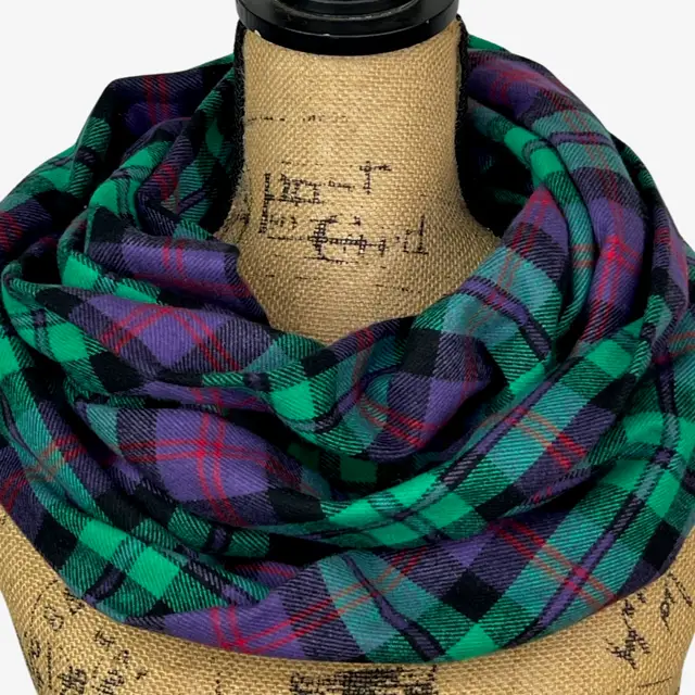 Scarf spearmint green purple deep red black plaid flannel infinity scarf draped on mannequin on Tampa Home & Garden Store