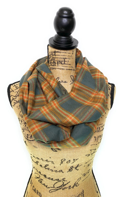 Infinity scarf in dusty deep teal with sage and persimmon orange plaid, Luxe Collection wrapped on Tampa Home & Garden Store