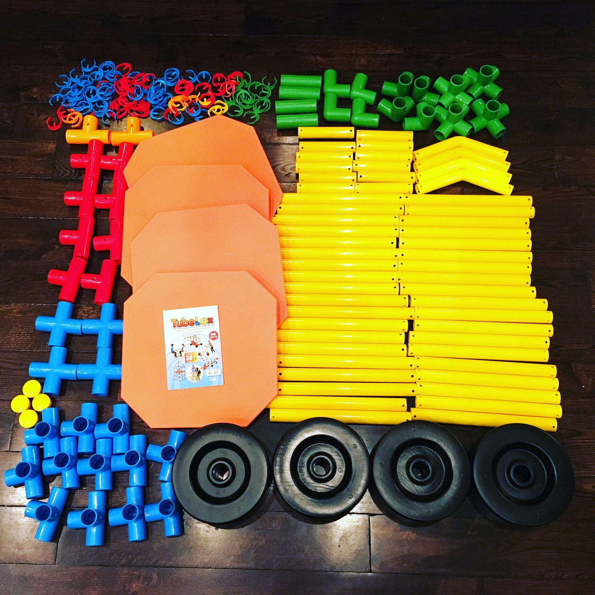 TubeLox Deluxe Set STEM Toy with blue/red connectors and yellow rods; 3 orange storage bags on Tampa Home & Garden Store
