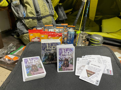 Life in a Pack Survival Playing Cards deck by River Country Gear, two purple-mountain card decks on Tampa Home & Garden Store