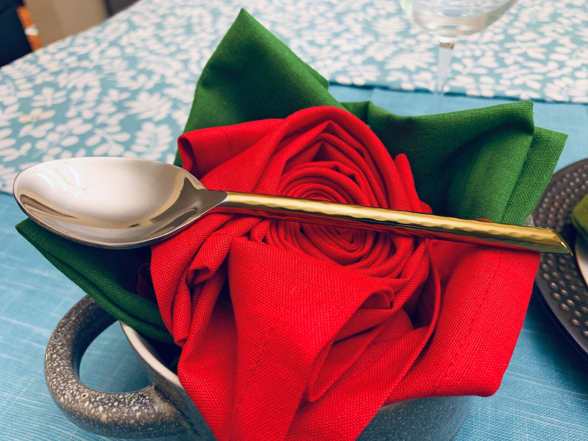 Vibhsa Golden Silverware Flatware set of 30 pieces spoon on red napkin with green napkin on Tampa Home & Garden Store