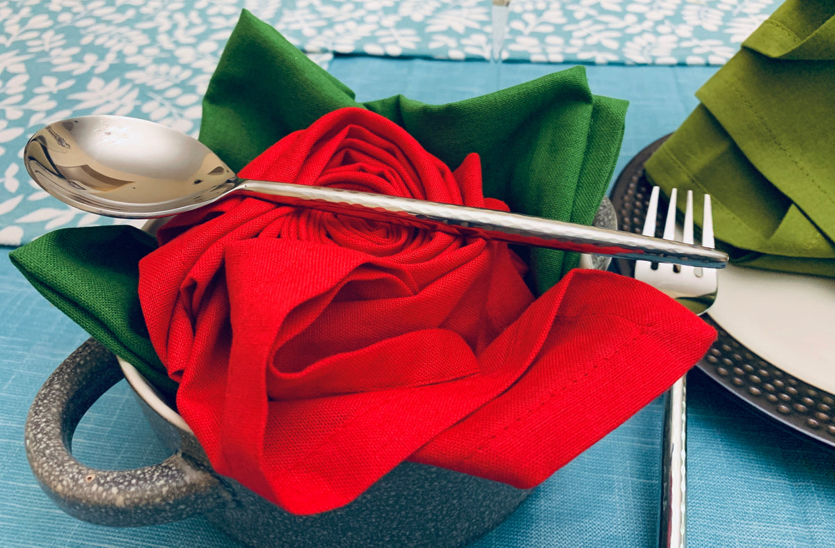 Vibhsa hammered silver flatware set, stainless steel, spoon and fork on red green napkins on Tampa Home & Garden Store