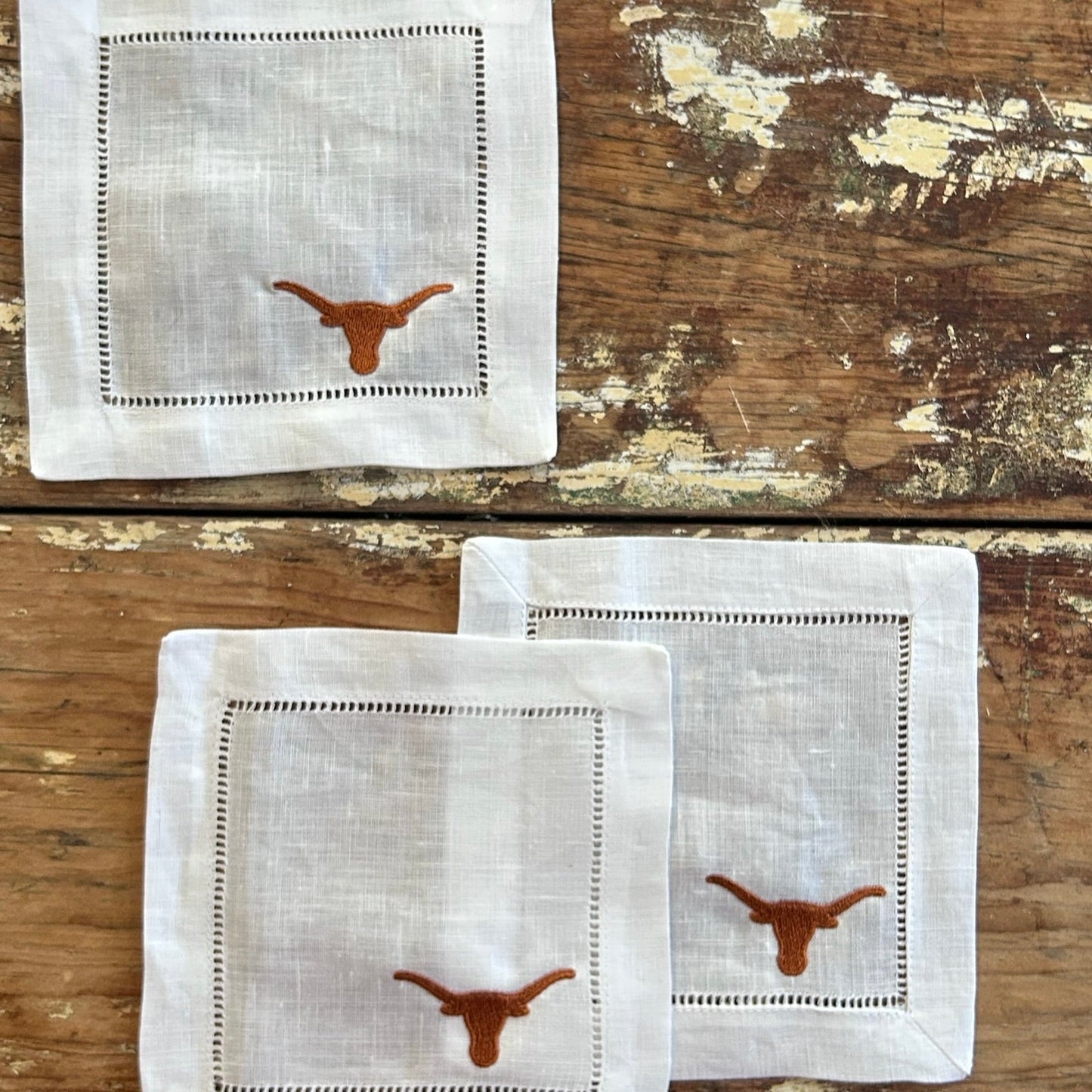 Texas Longhorns embroidered cocktail napkins in white linen with orange logo, set of 3 on Tampa Home & Garden Store