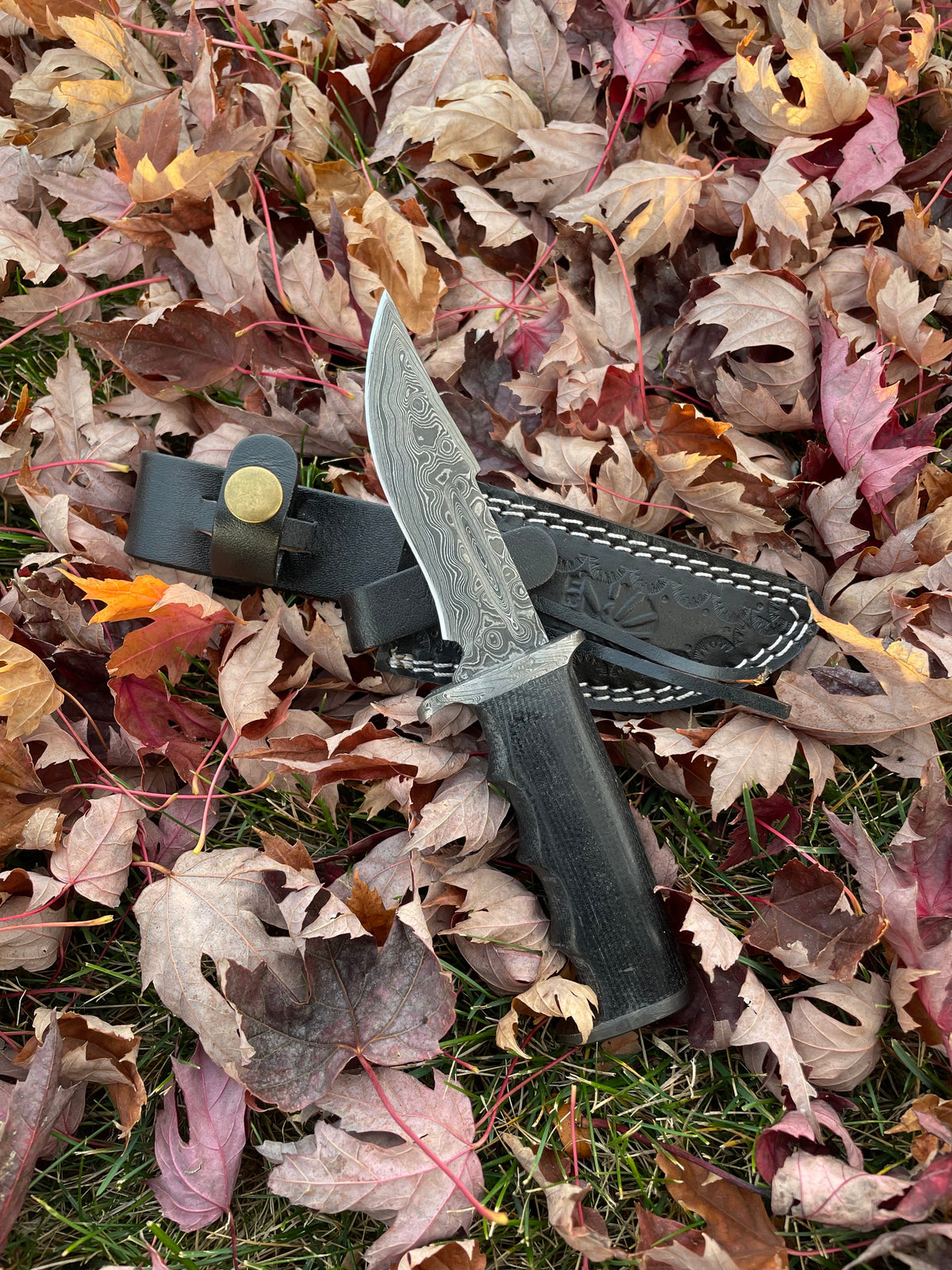 Darkwood Sentinel TK-211 Damascus knife with patterned blade and black leather sheath on Tampa Home & Garden Store